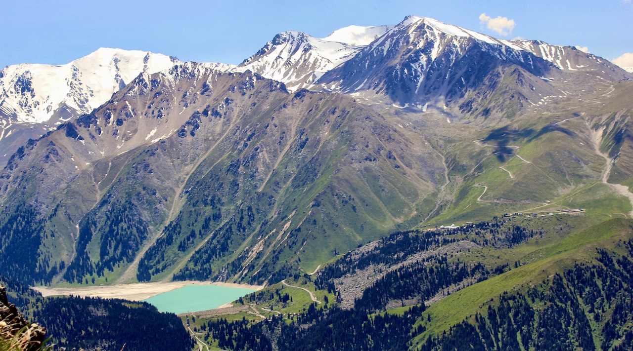 Panoramic view of Big Almaty Lake and surrounding snow-capped peaks, Northern Tien Shan